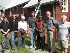 Team Effort 300x225 Green Pioneers Use Solar To Empower Community 