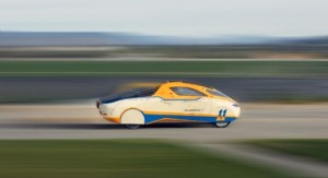 Solar car in motion 300x163 Solar Powered Gran Turismo Drives The  Globe
